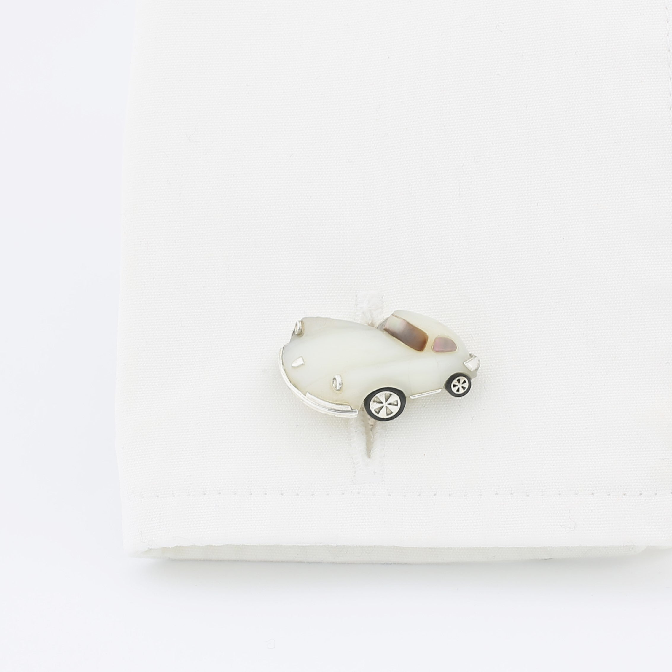 white opal sports car - cuff