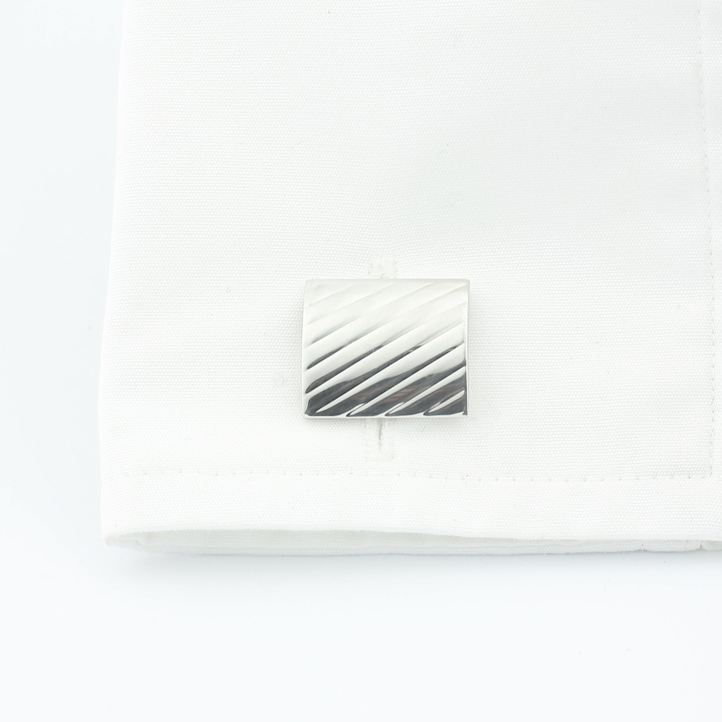 horizontal oblong curved cufflinks in silver - cuff